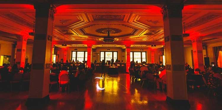 Red uplighting in banquet hall